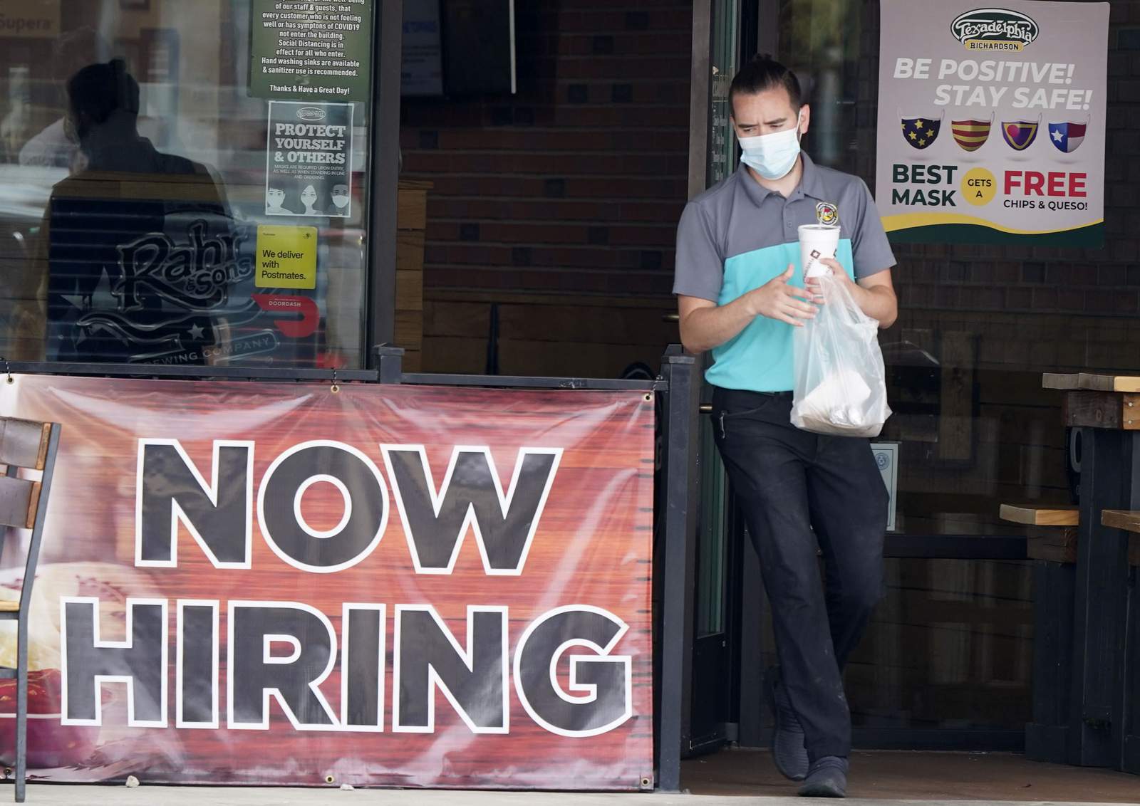 Jobless claims fall to 751,000, but new infections a threat