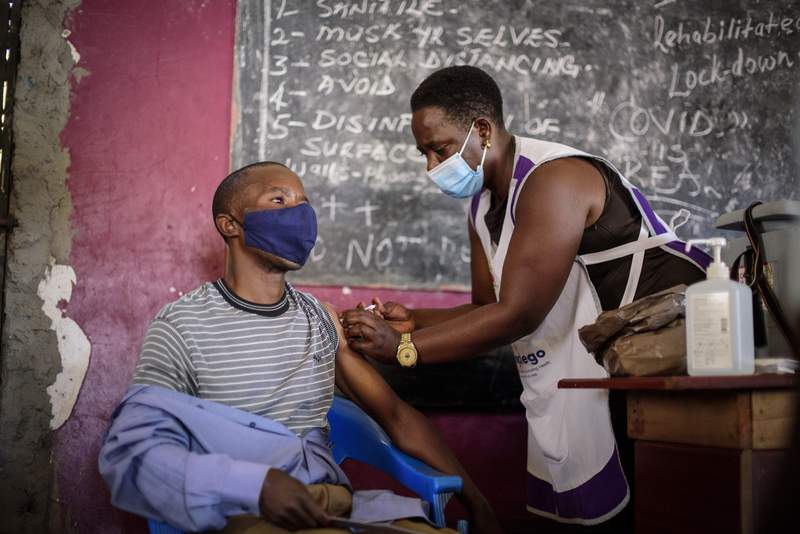 With more doses, Uganda takes vaccination drive to markets