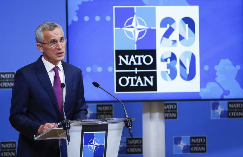 NATO chief says Afghan exit going well as 10 die in attacks