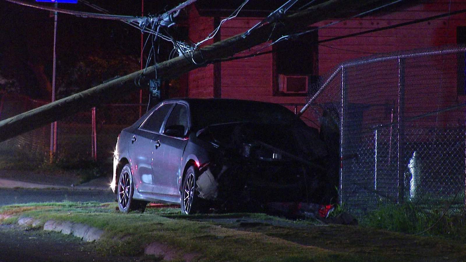 Driver loses control of vehicle, crashes into pole and fence, police say