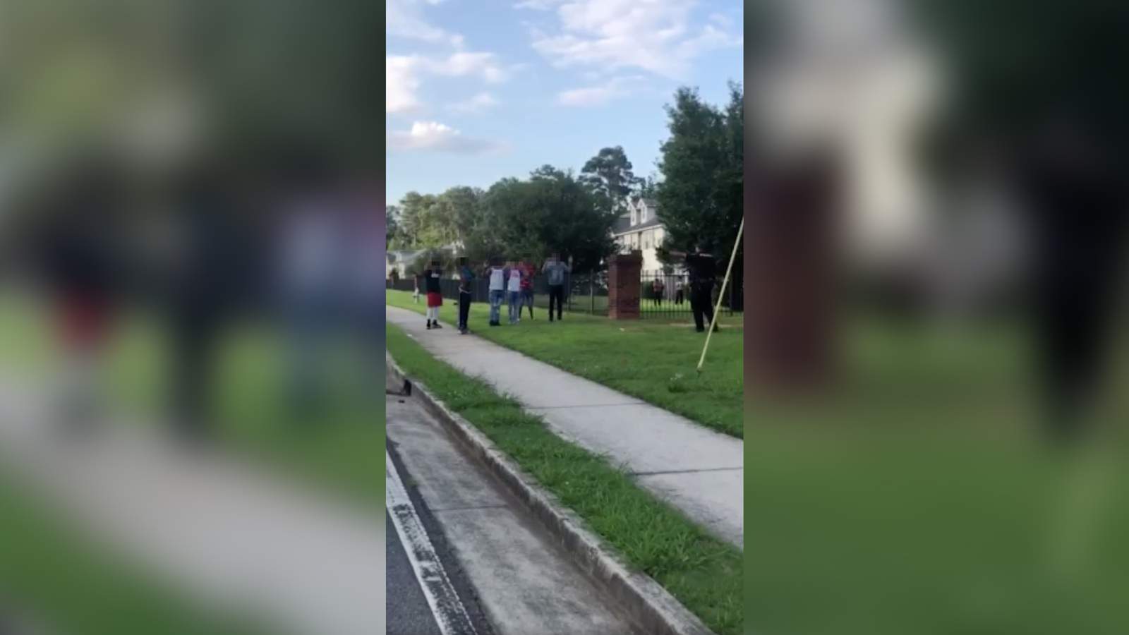 A Georgia cop pointed a gun at a group of teens. Neighbors stepped in to protect them