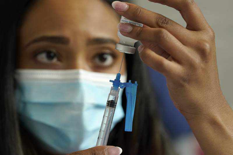 The Latest: UN chief decries pandemic's harm to the poor