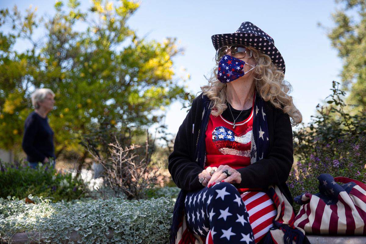 Masks, lines and clear skies: Photos from Election Day in Texas