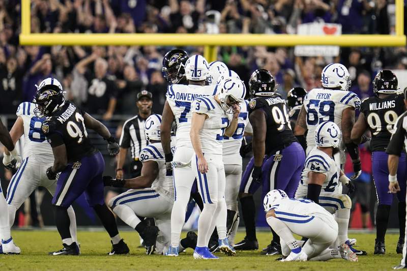 Colts don't get their kicks in 31-25 OT loss to Ravens