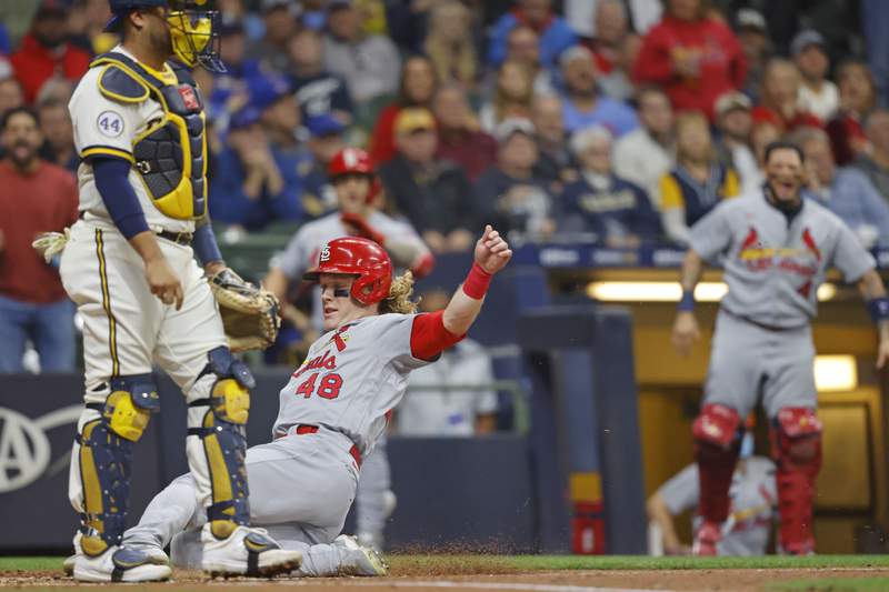 Cards win 11th in row, best streak since 2001; stall Brewers