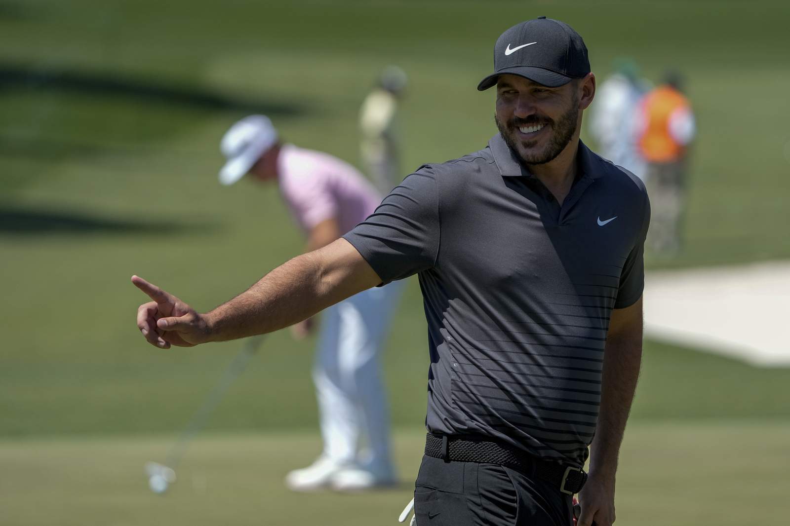 Koepka hobbled, but plans to fight through at the Masters