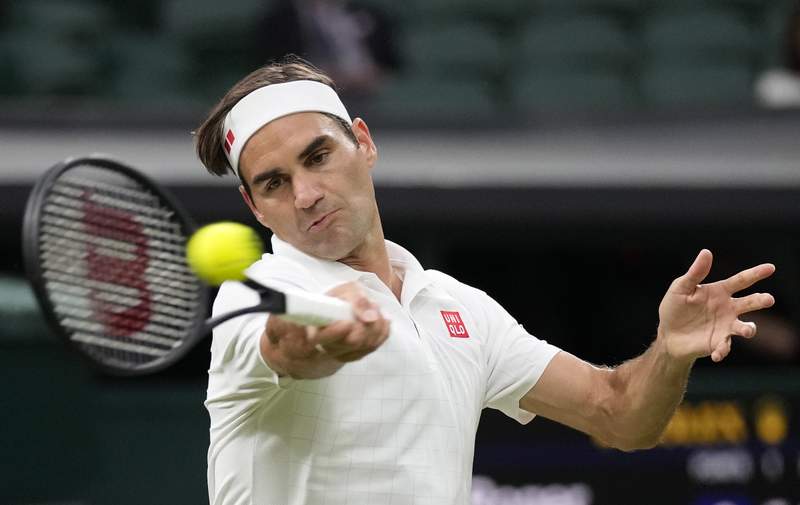 The Latest: Federer back in Wimbledon quarters at 39