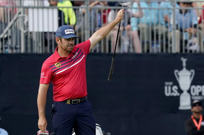 The Latest: Trio leads the U.S. Open after three rounds