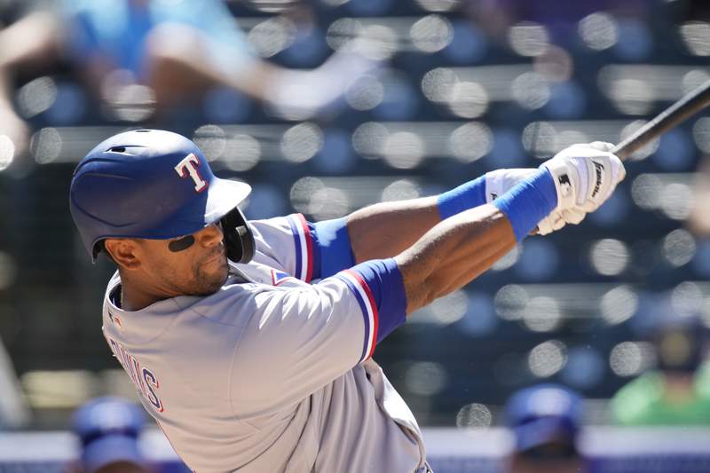Khris Davis DFA'd by Rangers, who want look at young players