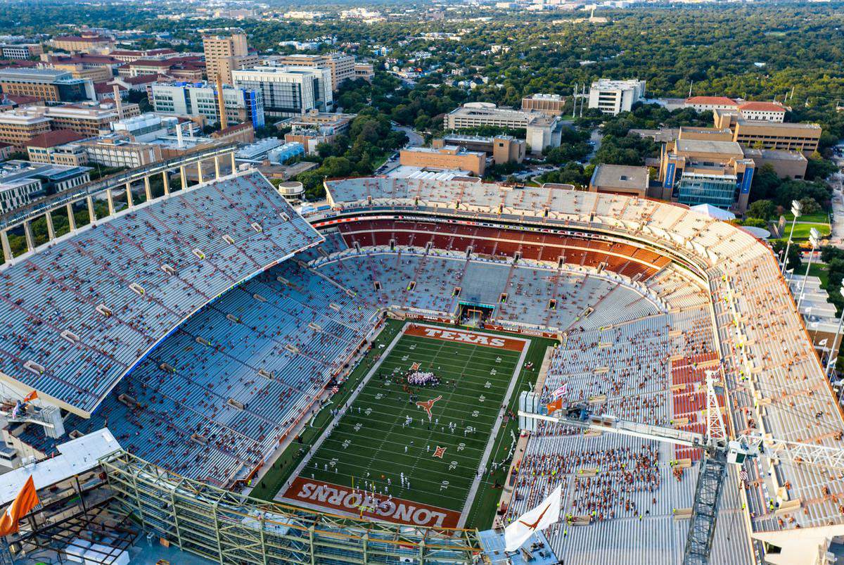 “It’s like walking into a ghost town”: Under tight pandemic restrictions, college football returns to Austin