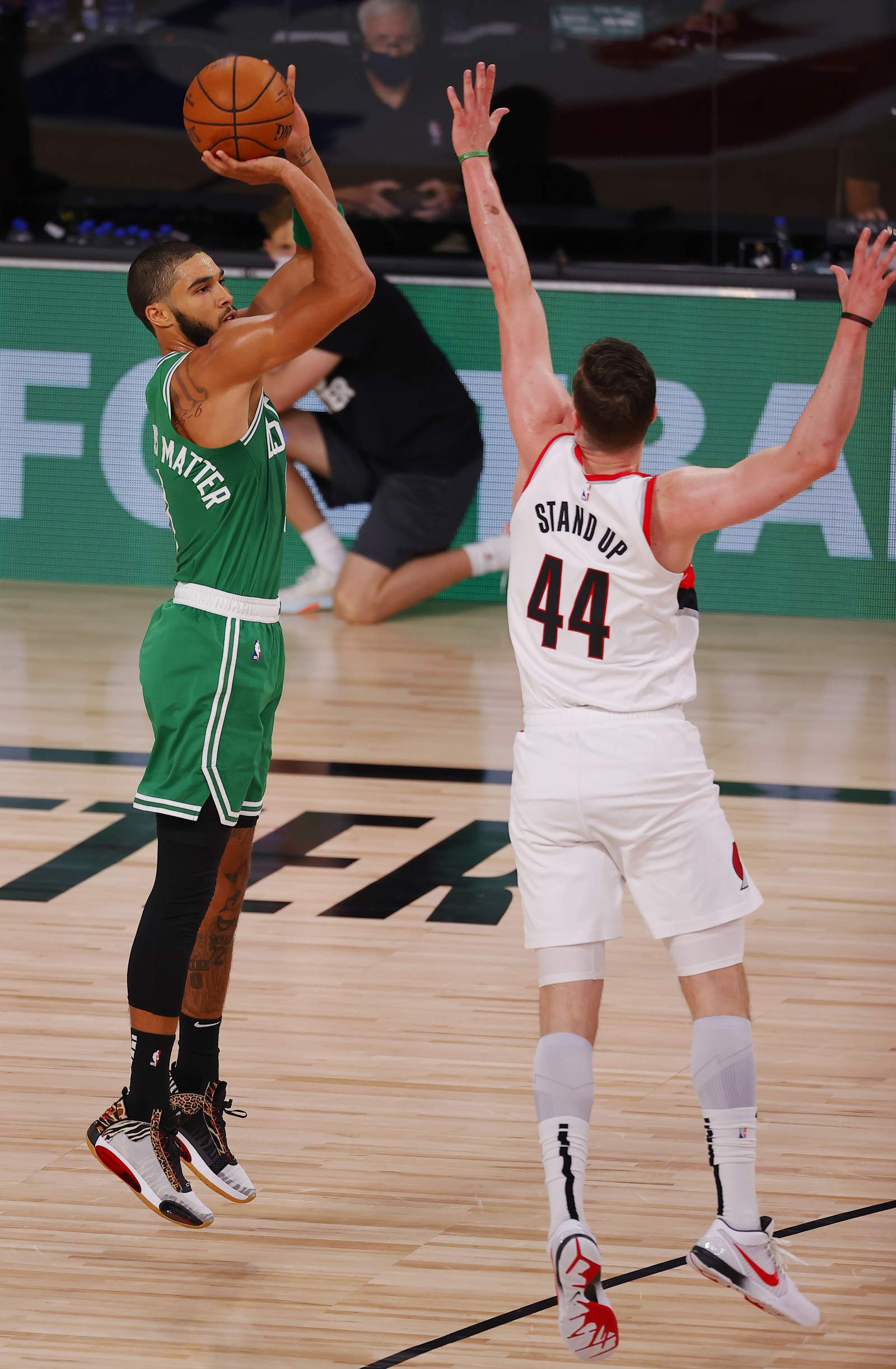 Tatum has 34 as Celtics beat Trail Blazers 128-124