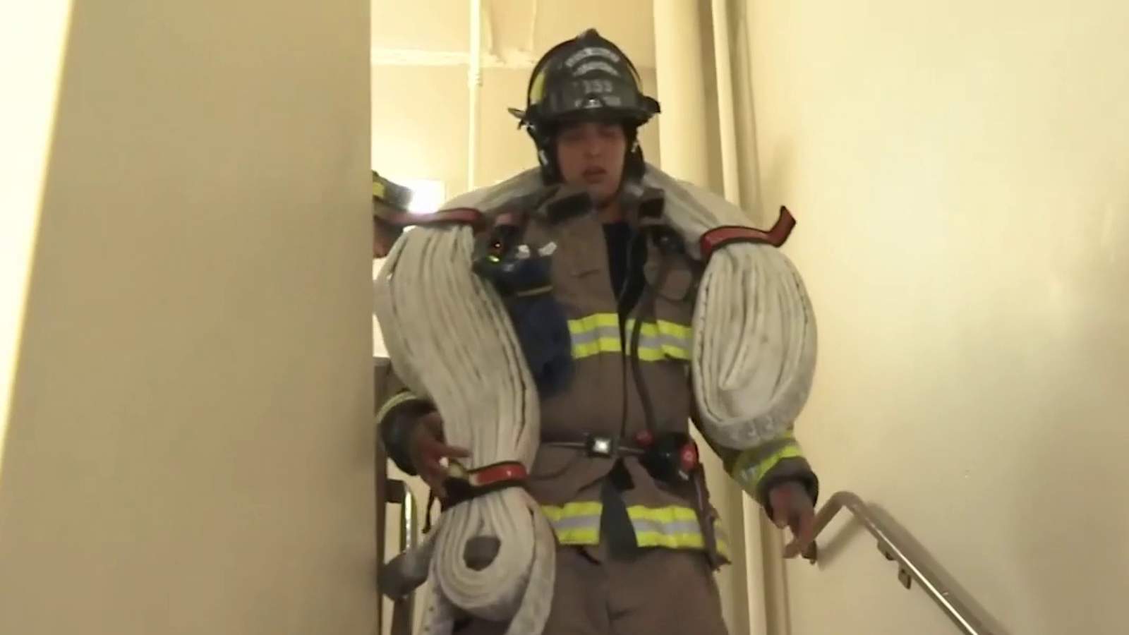 Leon Valley first responders climb flights of stairs on 9/11