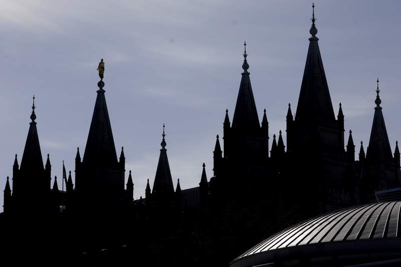 Mormon church to require masks in temples amid COVID surge