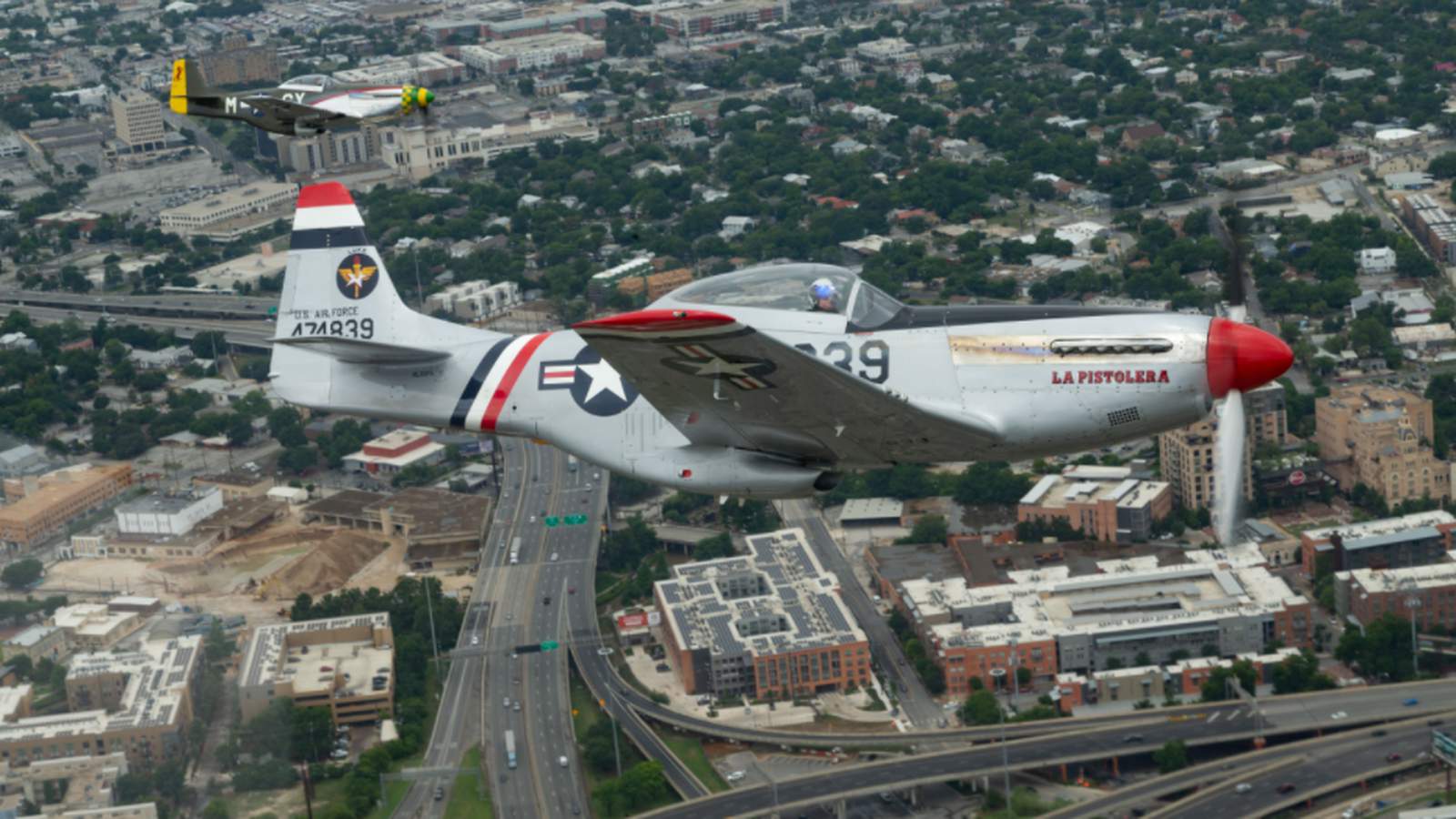 Watch World War II-era airplanes fly over San Antonio from a bird’s eye view