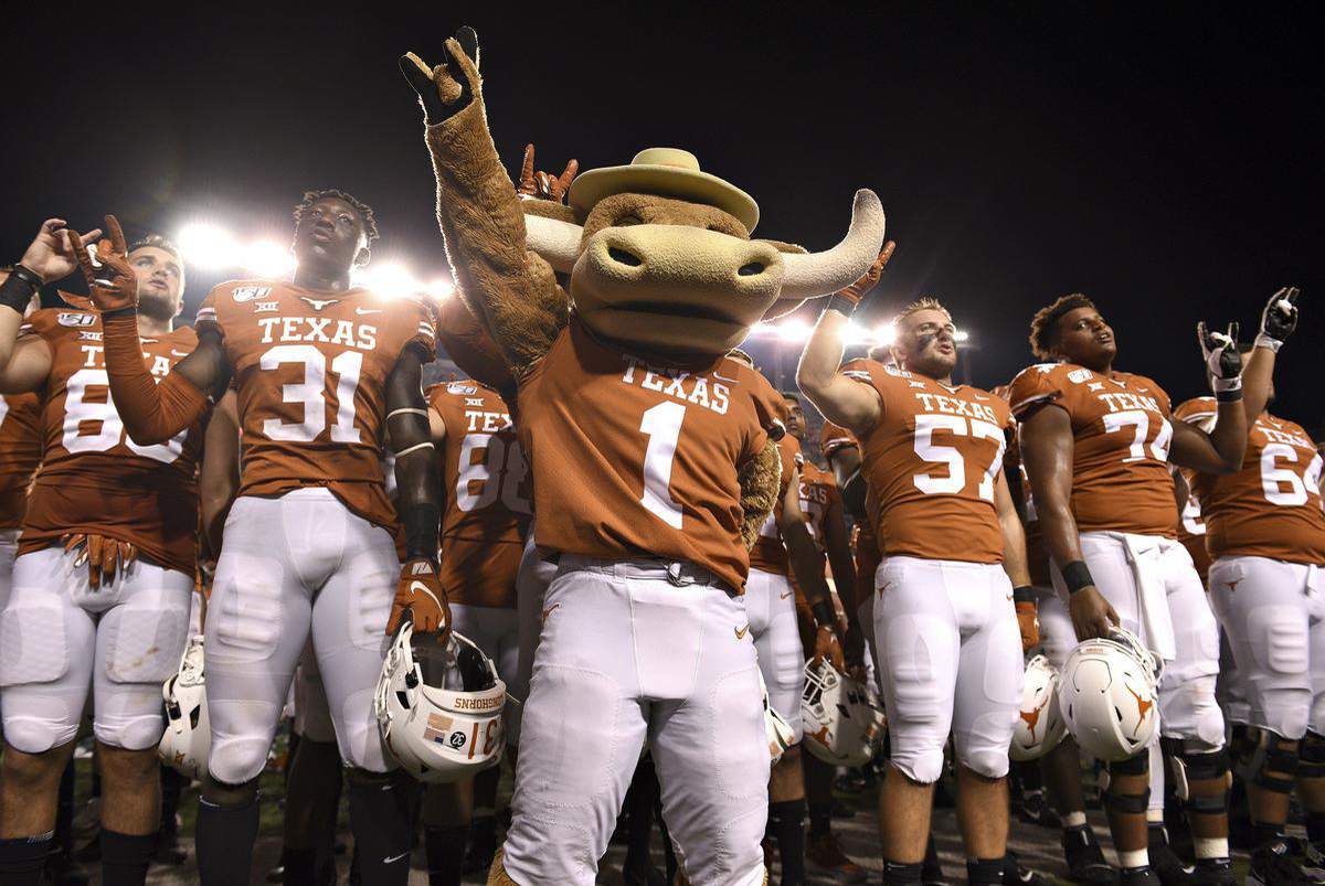 Texas college football returns with thousands of fans in the stadiums as campus cases grow