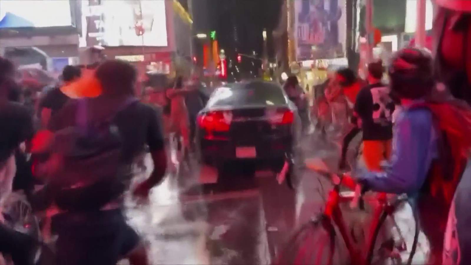 Car caught on video plowing through Times Square protesters