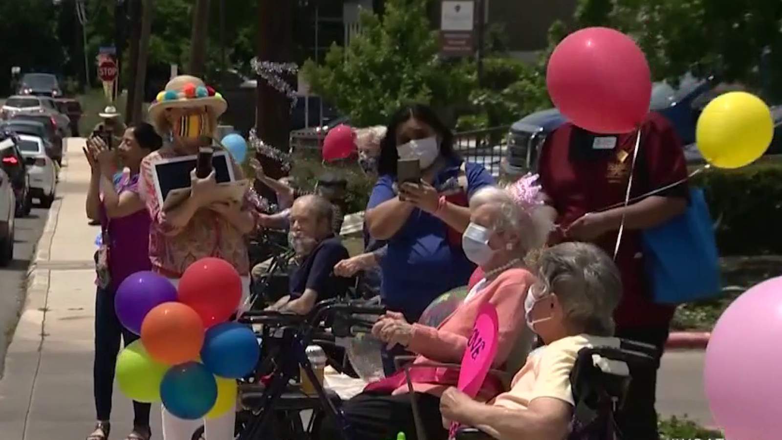 Family throws surprise drive-by birthday parade for 105-year-old loved one