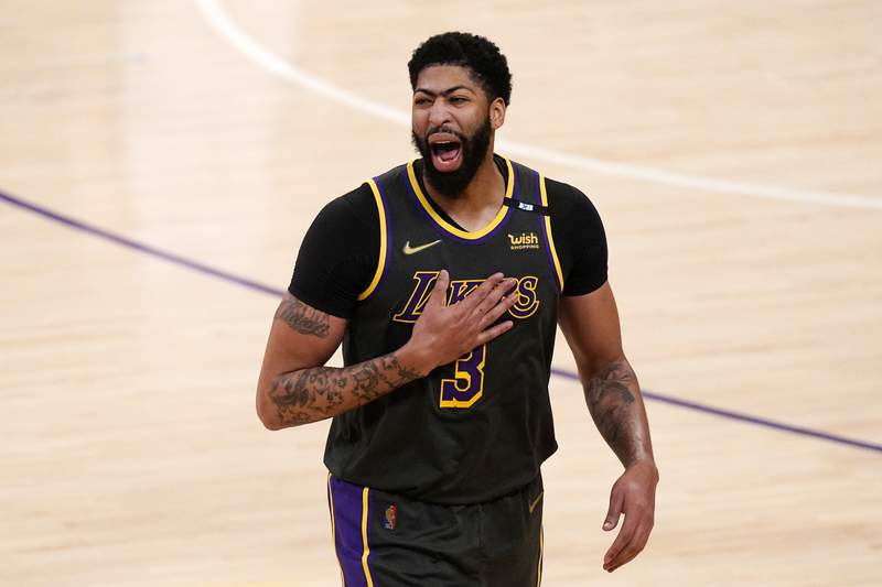Davis scores 25 as short-handed Lakers defeat Nuggets 93-89