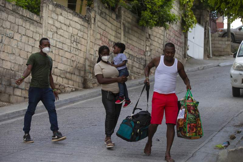 Back in Haiti, expelled migrant family plans to flee again