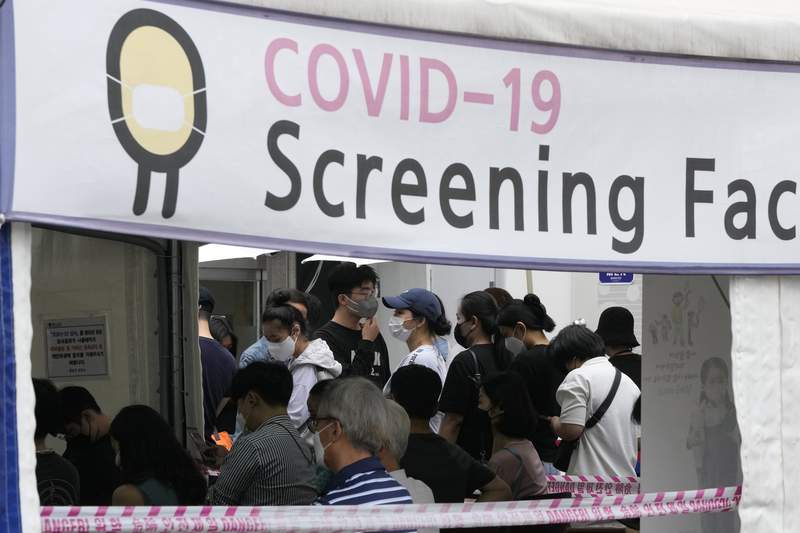 The Latest: S. Korea clamps down amid virus spike