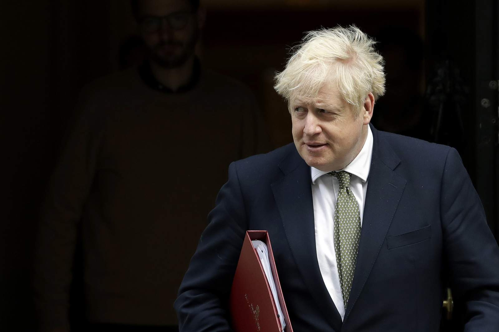 As virus surges, isolated UK leader Johnson faces many foes