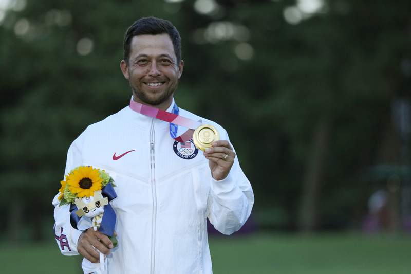 Xander Schauffele with 2 clutch putts gives US gold in golf