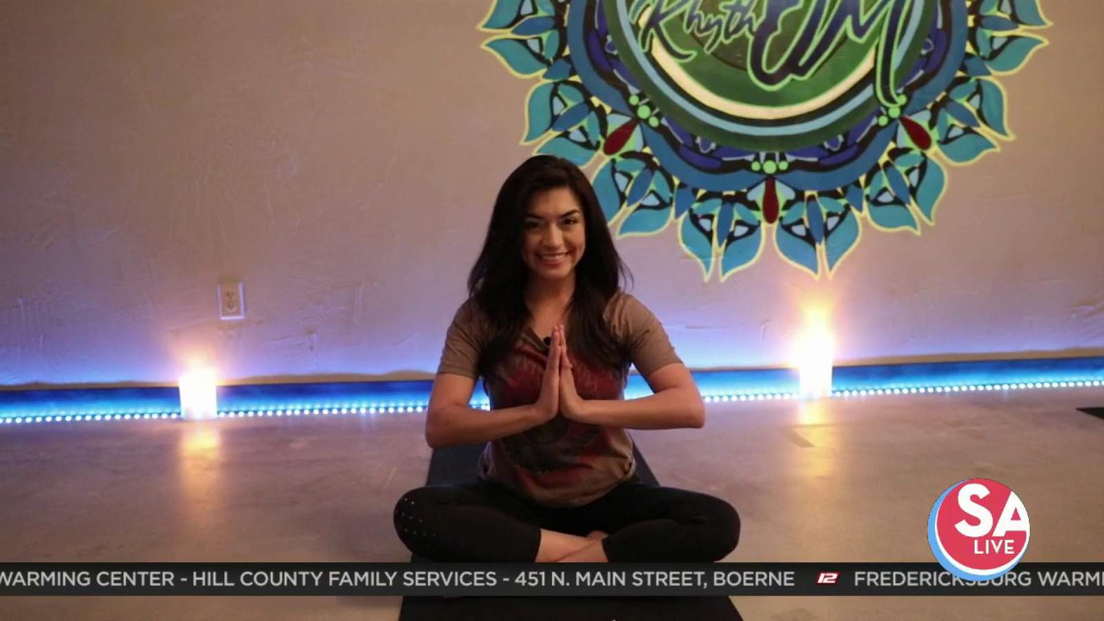 Yoga studio combines heat, candlelight to melt the stress away