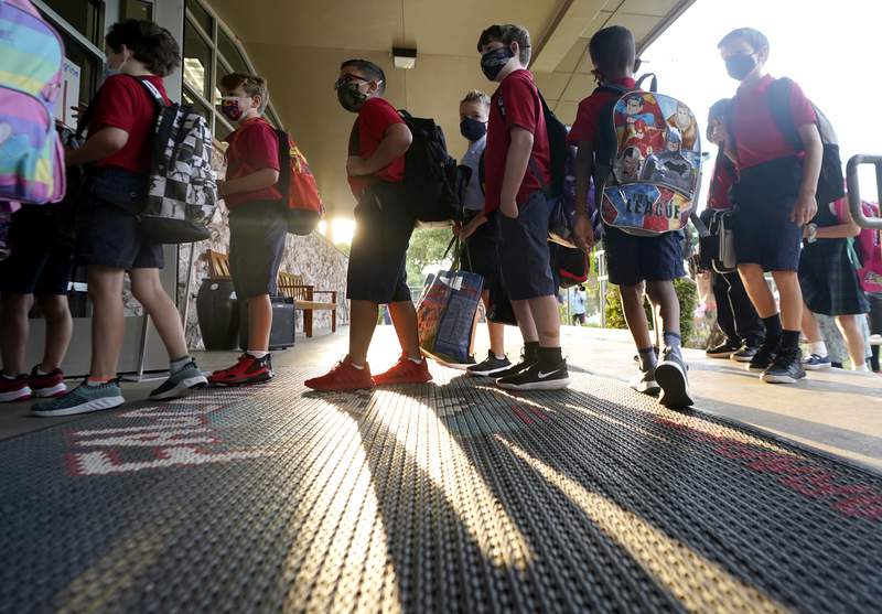 Texas Attorney General’s Office says 7 counties, 48 school districts mandating masks