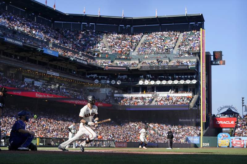 Duggar triples, Giants hold off Dodgers 6-4 for NL West lead