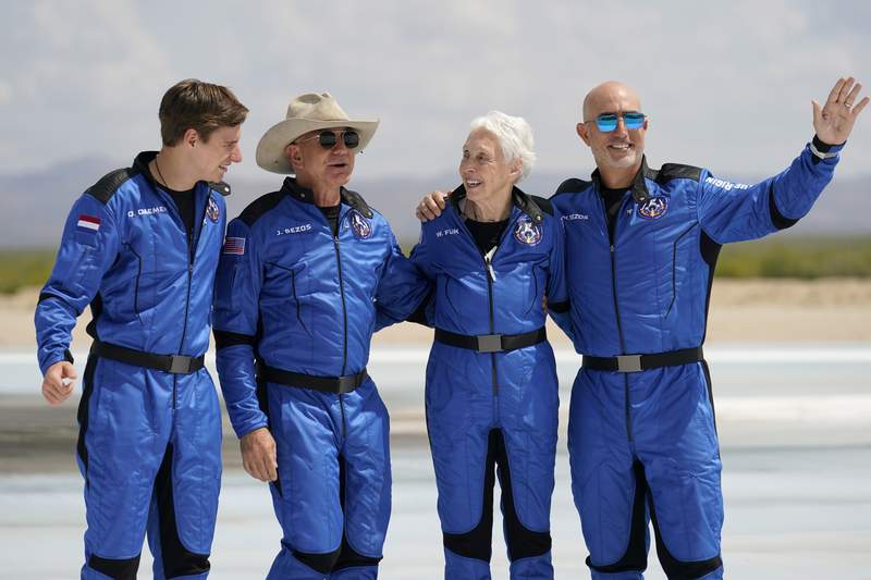 Jeff Bezos reaches space in Blue Origin’s 1st passenger flight after launch from West Texas