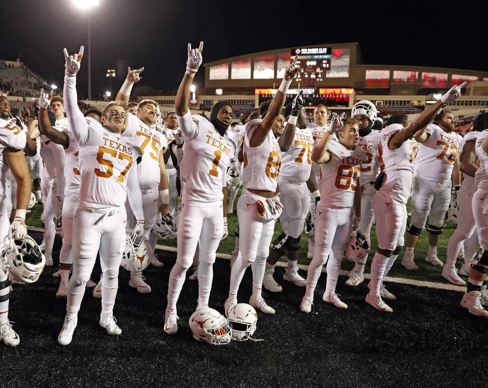 Herman says no mandate for Texas players over school song