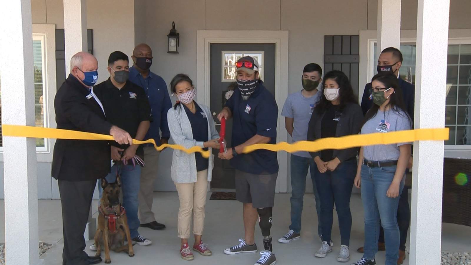 Wounded veteran gets keys to new home on Veterans Day