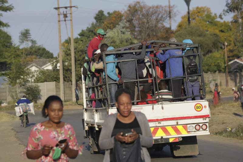 Zimbabwe returns to strict lockdown to fight virus surge