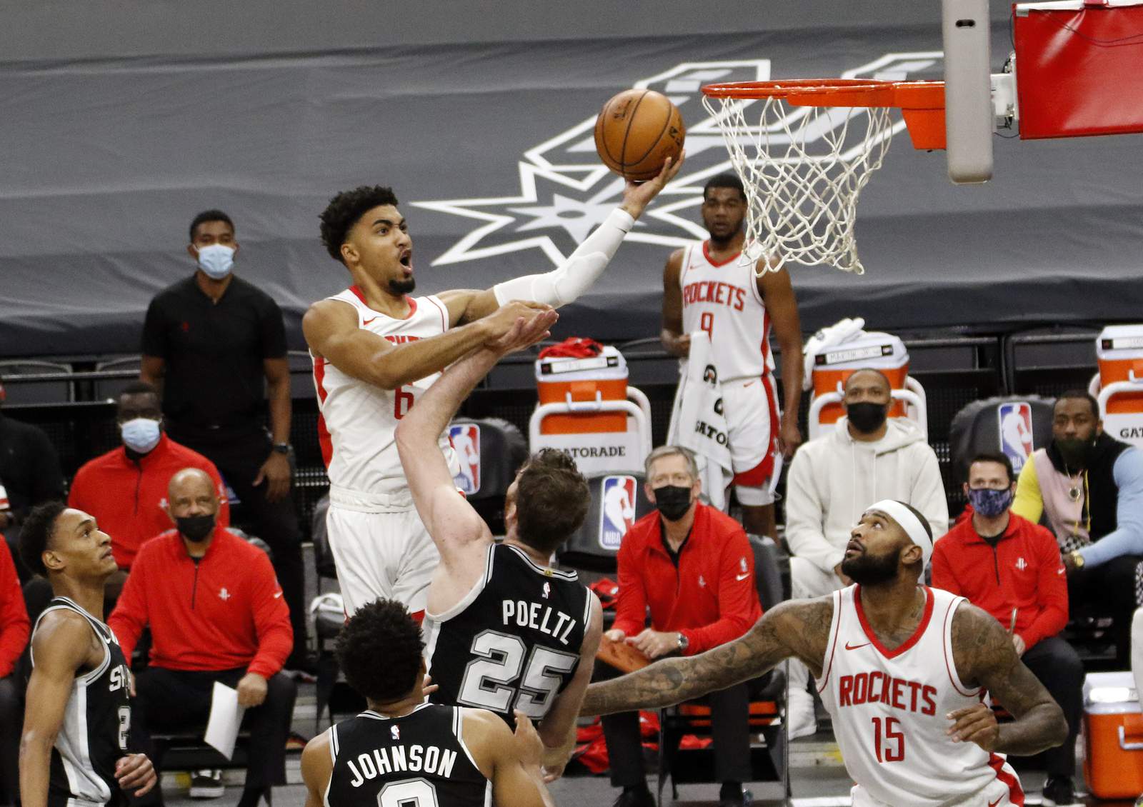 Spurs end 4-game home skid, top short-handed Rockets 103-91