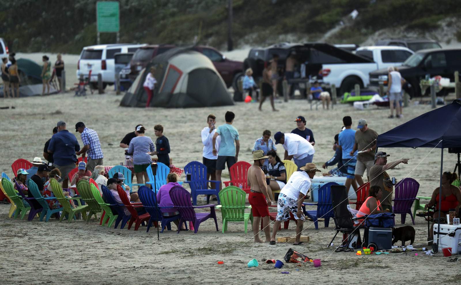 Photos show plenty of people flocked to beaches, but not a lot of social distancing or masks