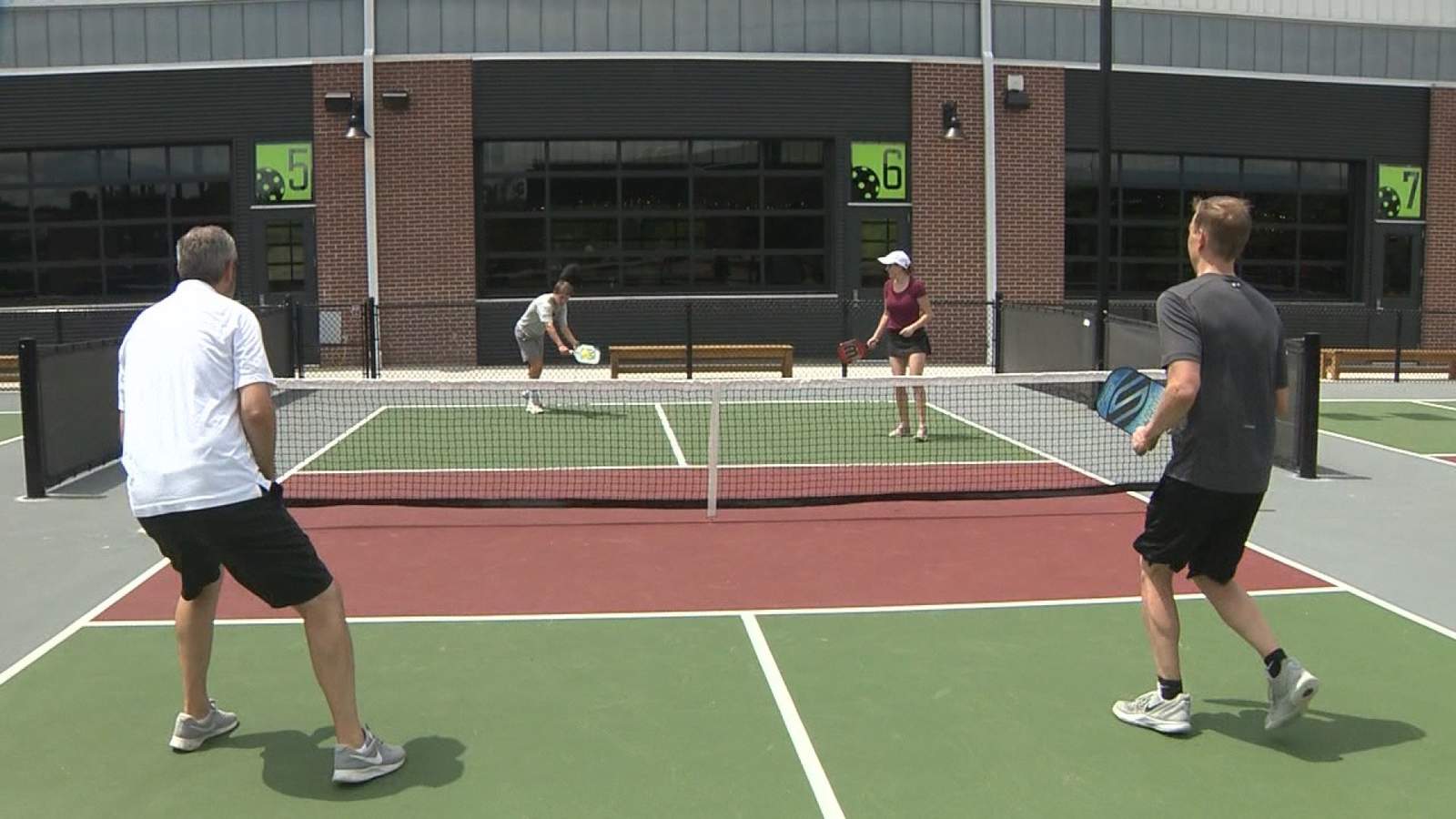 Chicken N Pickle-San Antonio demonstrates pickleball for Instant Replay Team