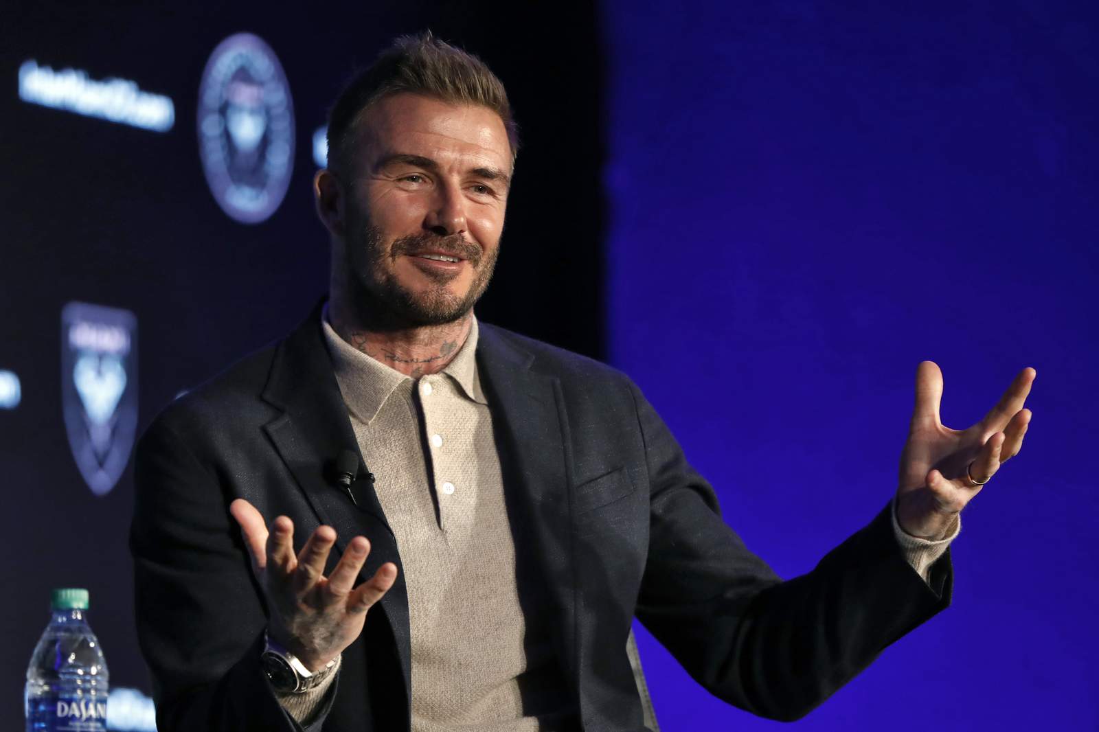 Beckham says Neville hired as coach on merit, not friendship