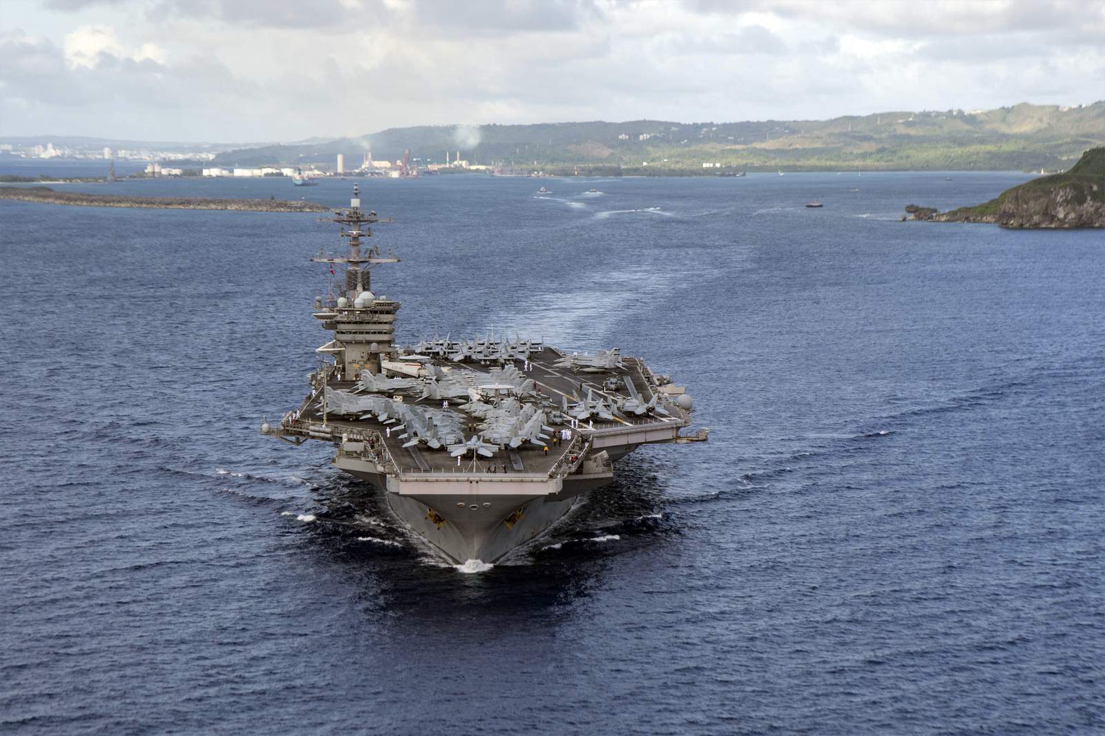 Navy carrier sidelined by virus is back operating in Pacific