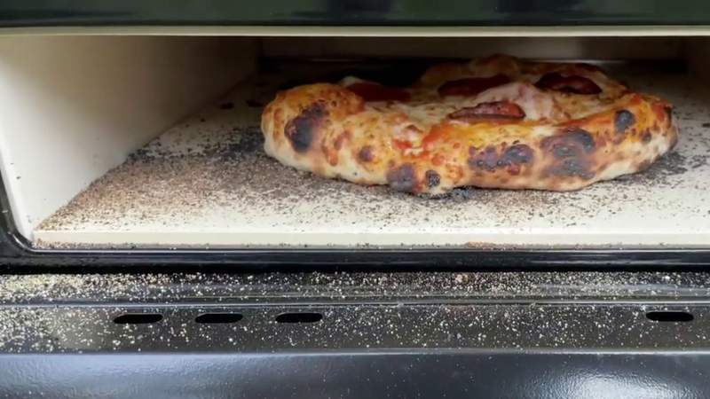 Portable ovens let you make wood-fired pizza in your own backyard