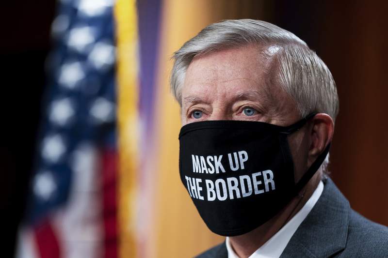 Graham says he's told Trump to 'speak up' on COVID vaccines