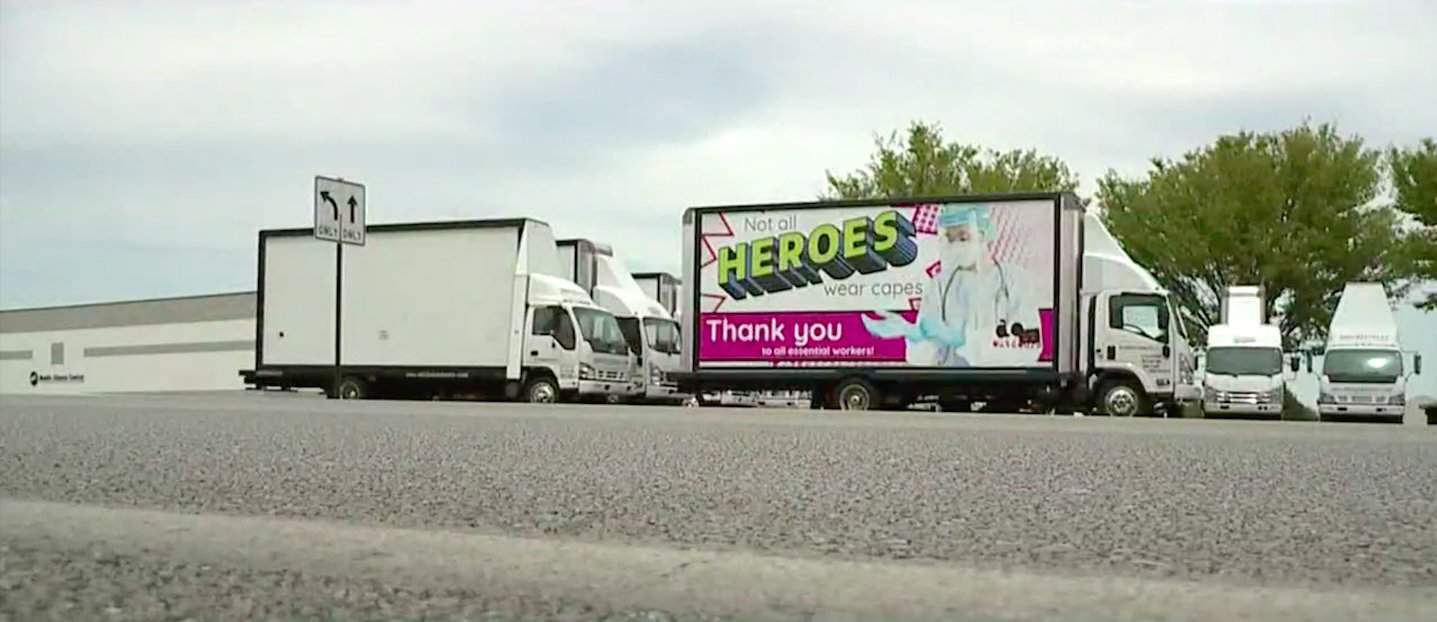 ‘Not all heroes wear capes’: Rolling billboards say thanks to essential workers