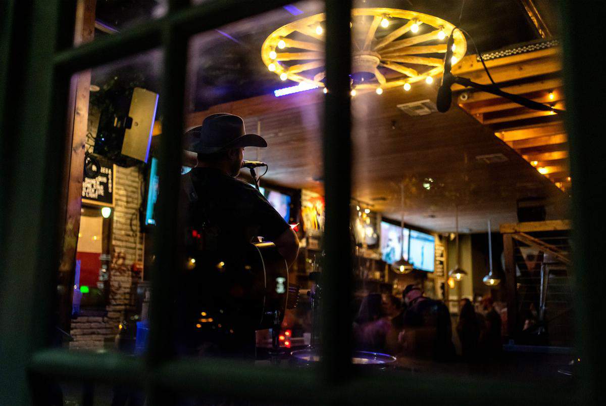 Gov. Greg Abbott said Texas counties can allow bars to reopen. Only 1 of the state’s 10 biggest counties has said it will.