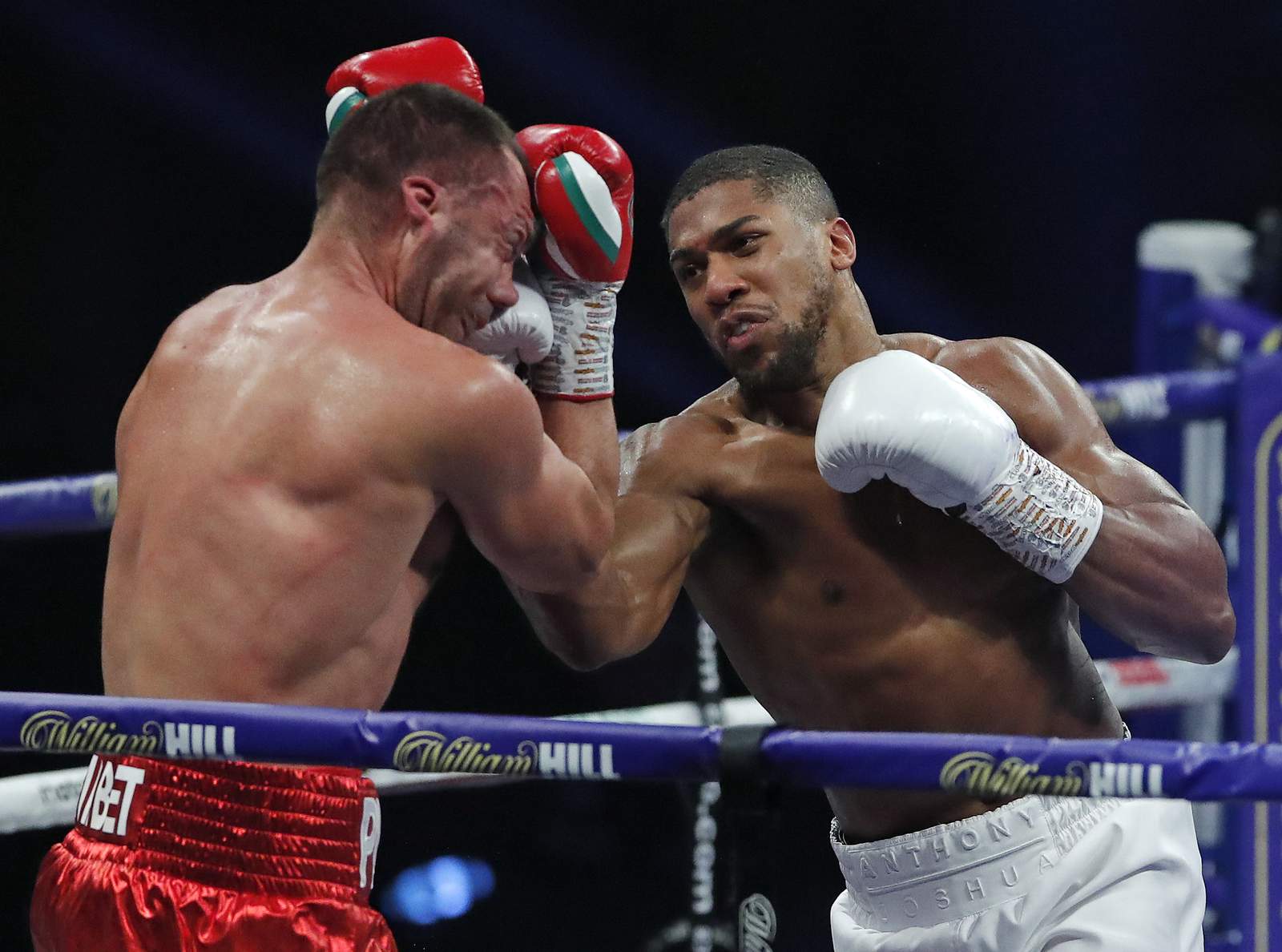 Joshua retains heavyweight belts with 9th-round KO of Pulev