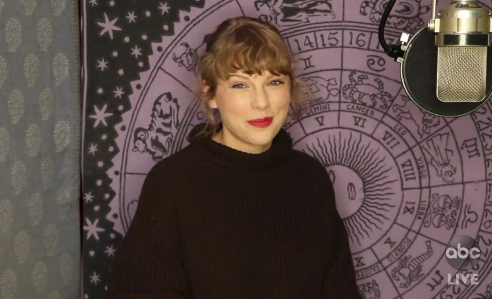 Swift wins top prize at AMAs, says she’s re-recording music