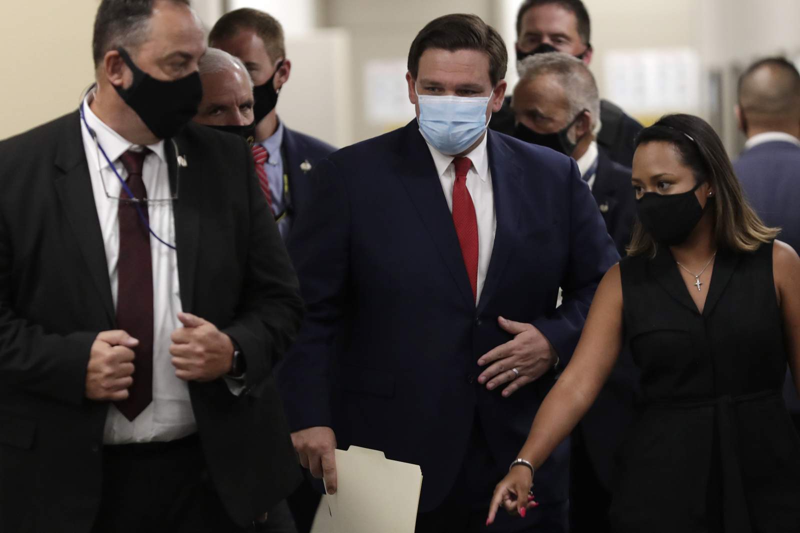 Pandemic becomes politically fraught for Florida governor