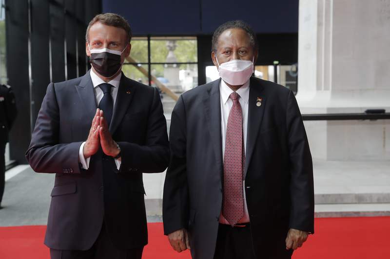 France holds global talks to offer debt relief for Sudan