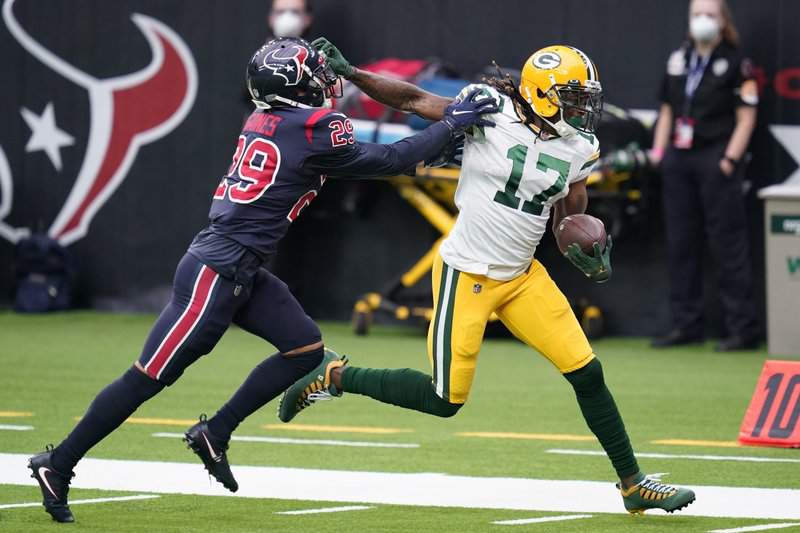 Rodgers throws 4 TDs as Packers beat Texans 35-20