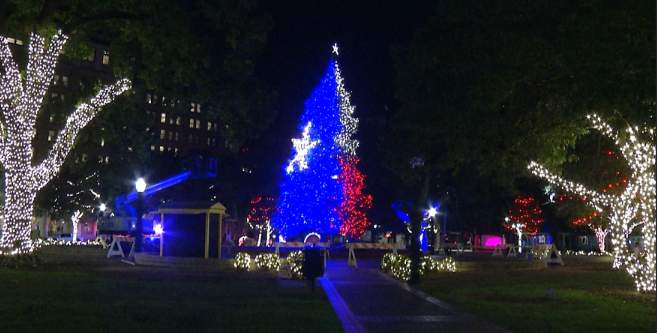 Christmas tree in Travis Park gets decorated with lights overnight