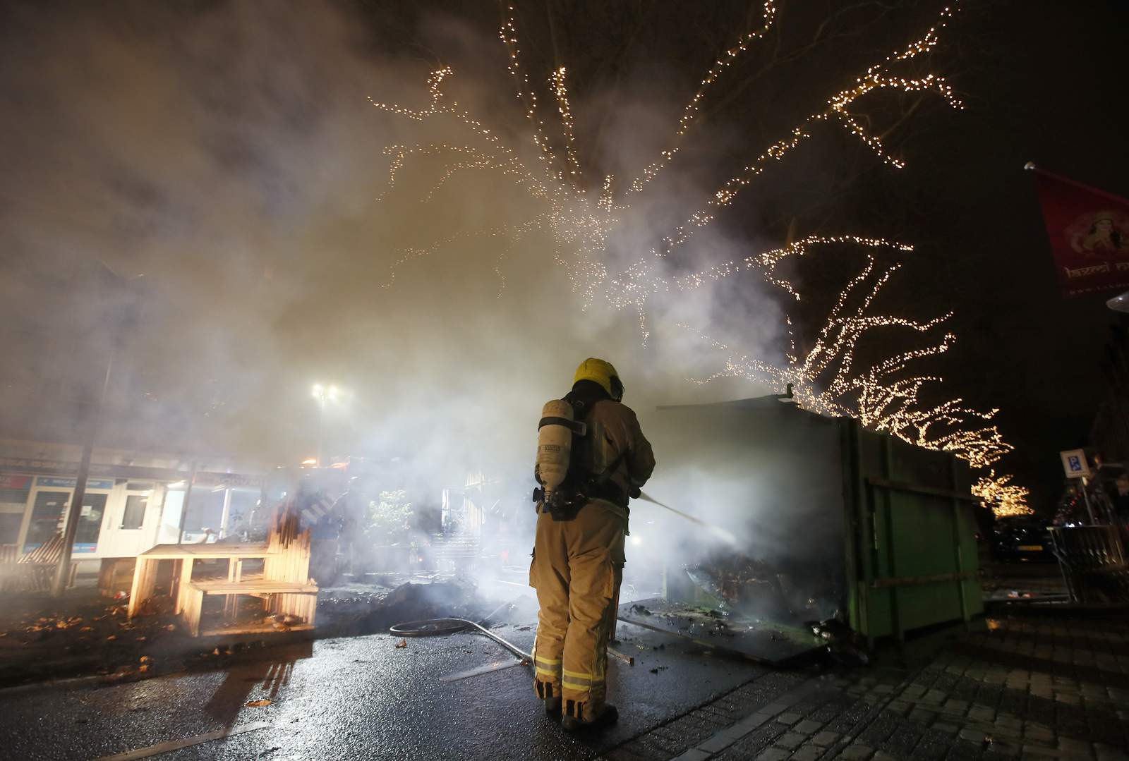 Dutch police use tear gas, water cannon amid rioting