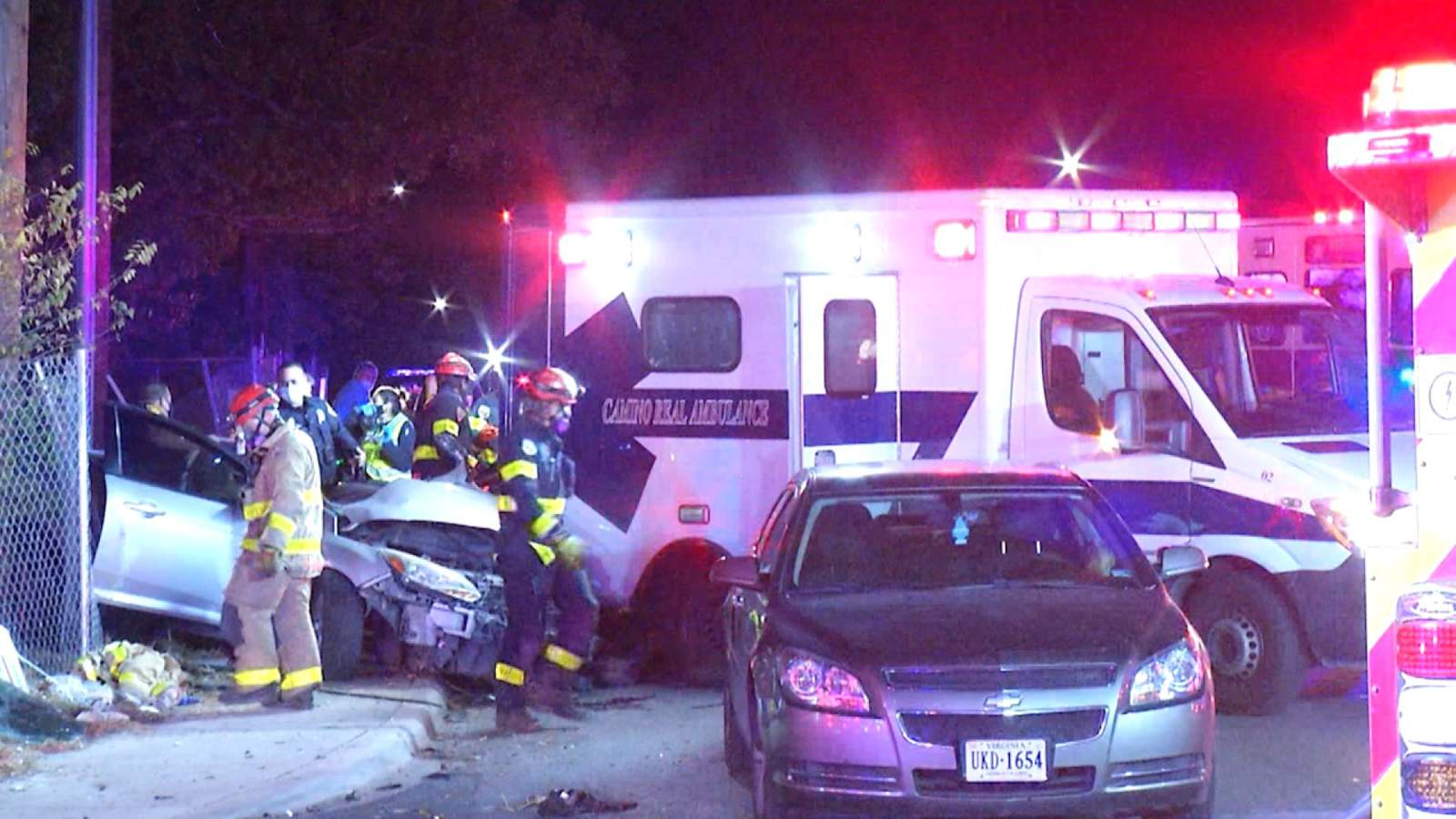 Driver pinned inside car during crash with ambulance, police say